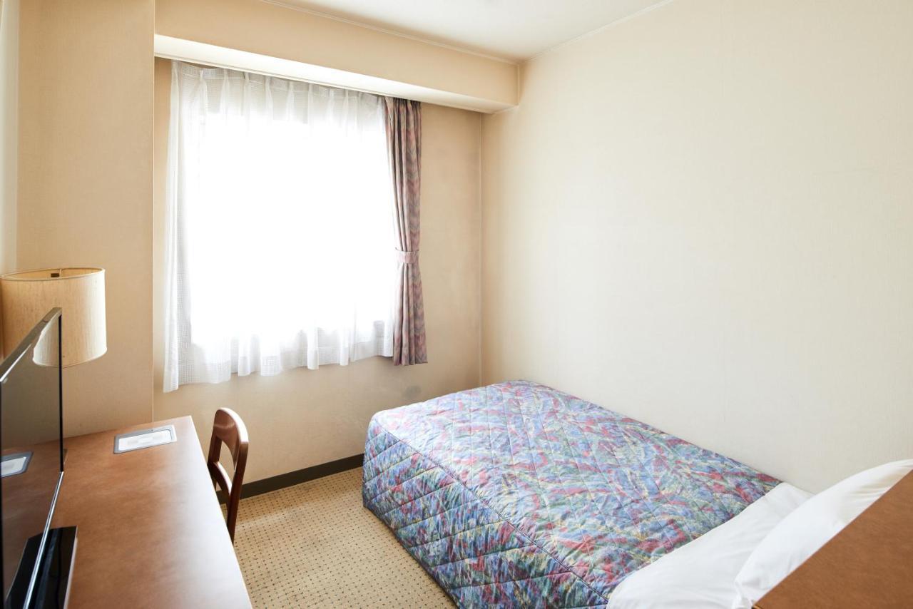 Marroad Inn Хатиодзи Номер фото